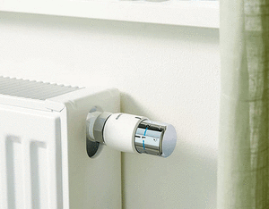 Термоголовка колір білий-хром для радіатора Oventrop Uni SH 1012065