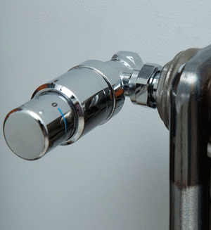 Хромована термоголовка для радіатора Oventrop Uni SH 1012069